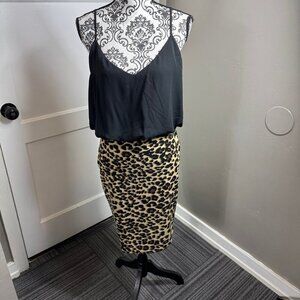 Guess black and cheetah print dress figure flattering.  Size large